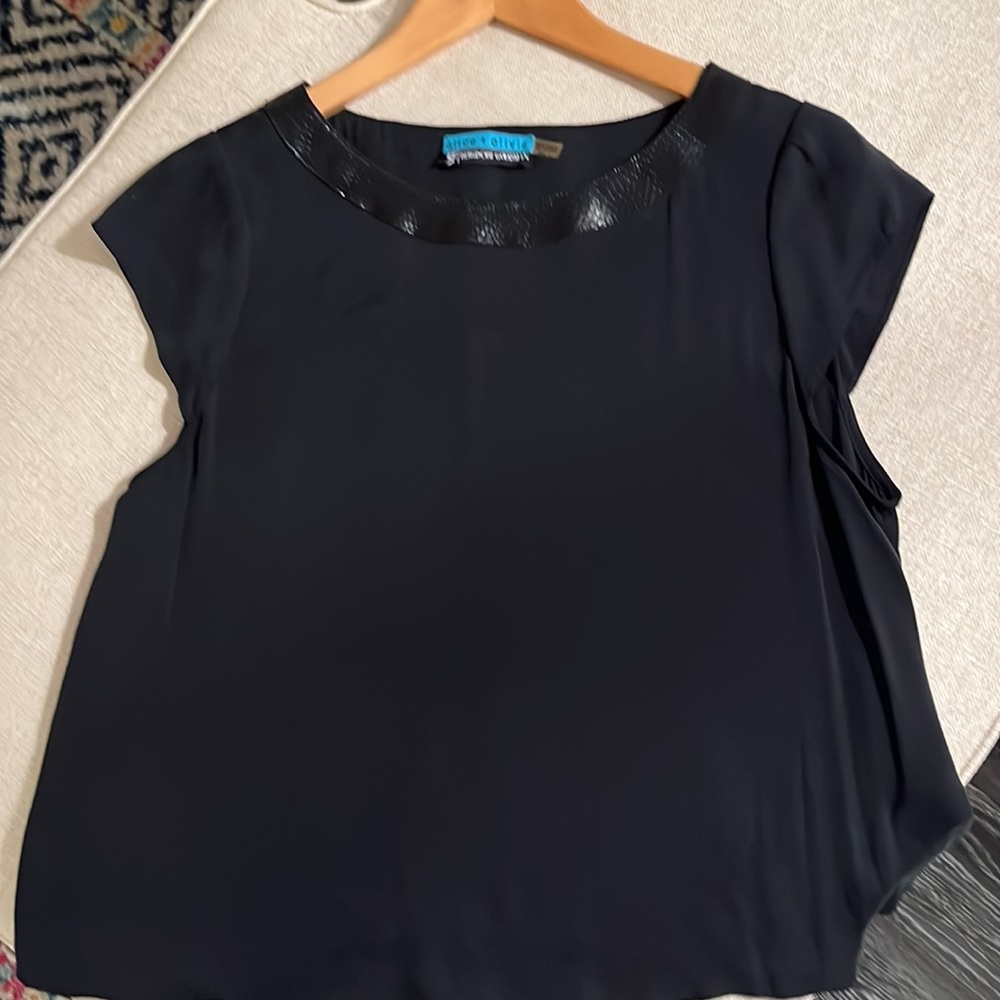 Alice + Olivia for Bergdorf Goodman black silk short sleeve top. Size M